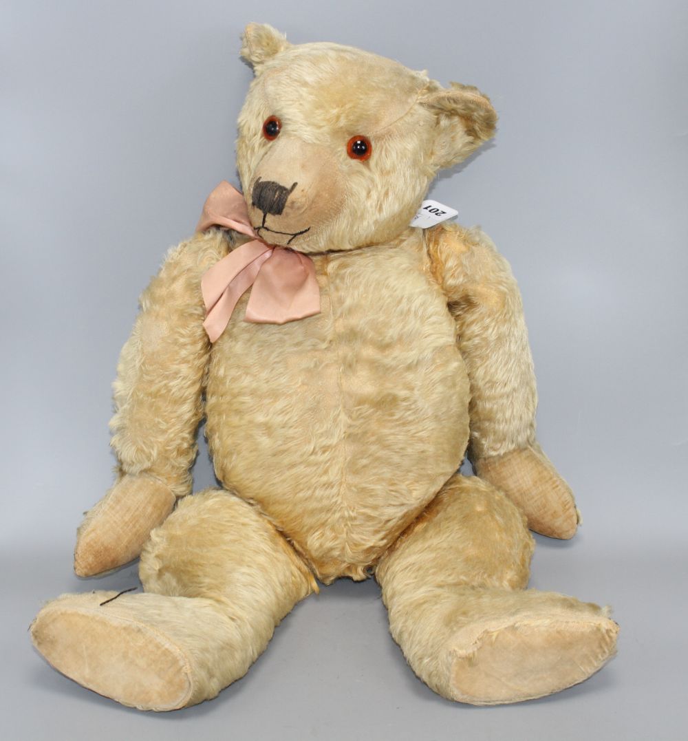 A Chiltern bear, c.1930, 27in., original velvet pads, some hair loss on right left arm and body